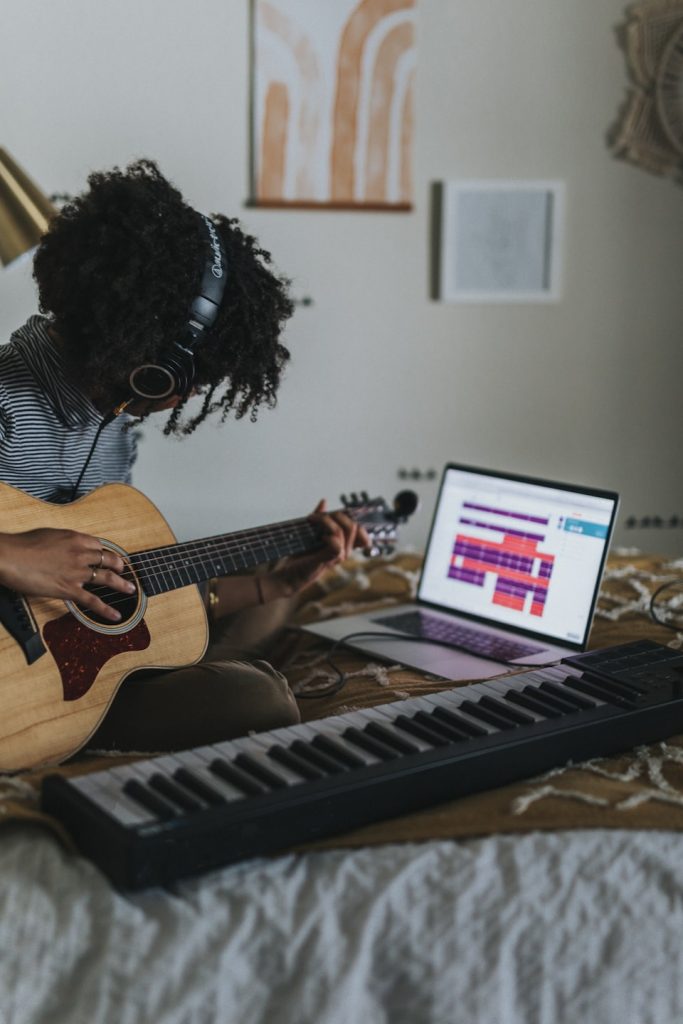 Musician playing guitar before therapy in Colorado