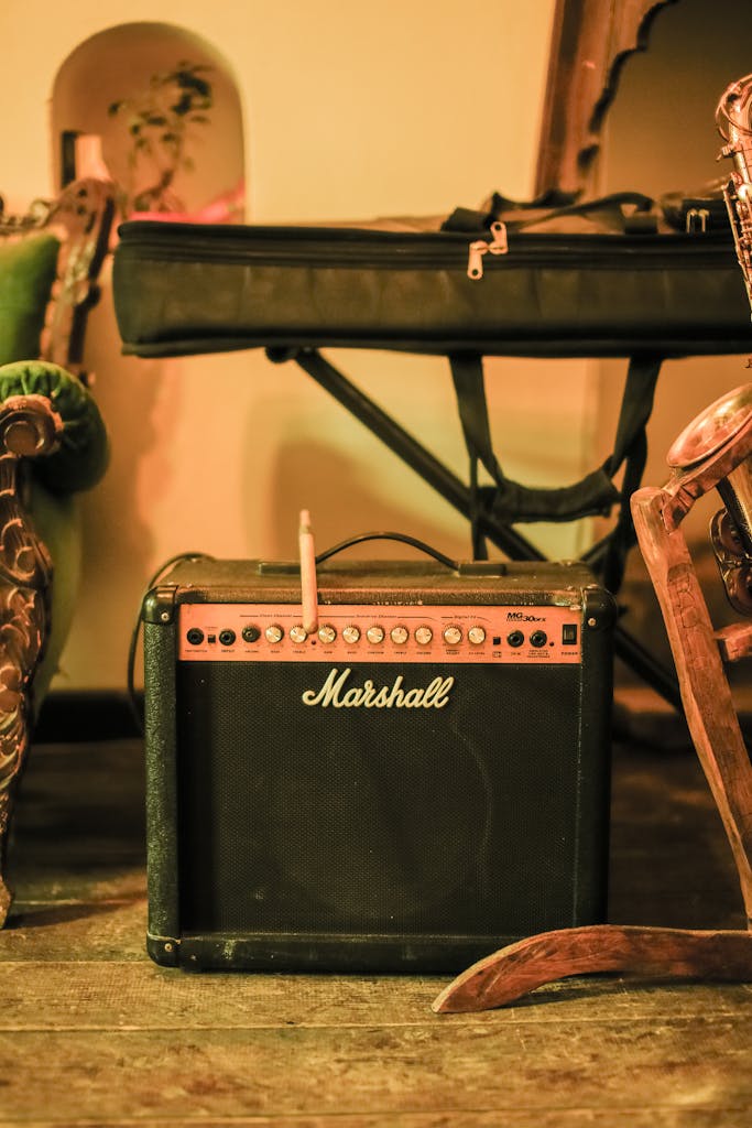 A Marshall amplifier placed on a wooden floor in a vintage-style room, exuding a retro vibe.